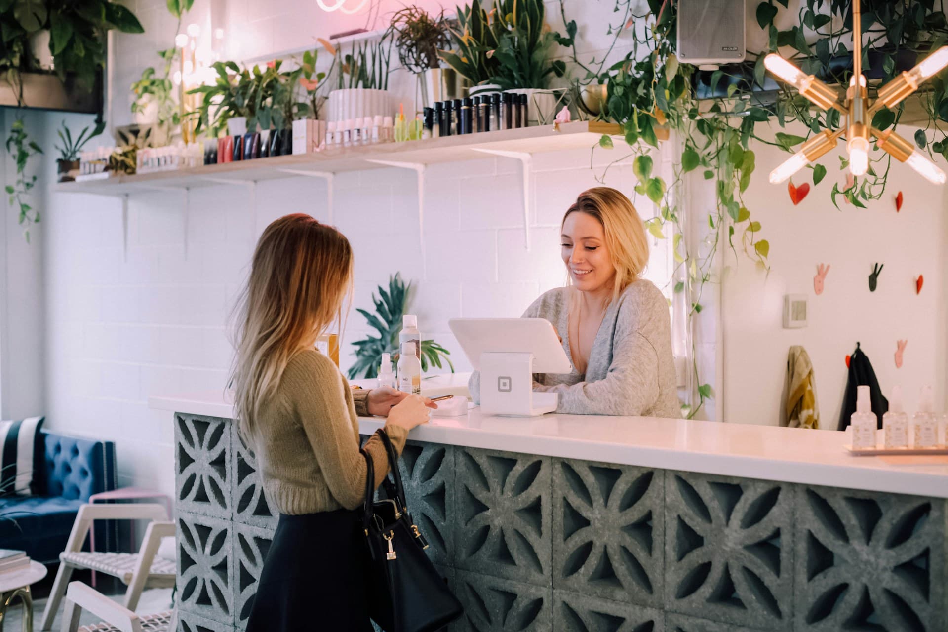 Woman at the cash register in a retail store